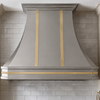 Faceted Curved Custom Stainless Steel Range Hood with Brass Straps