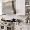 Faceted Curved Custom Stainless Steel Range Hood with Matte Brass Straps and Rivets