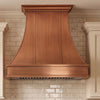 Smooth Curved Custom Copper Range Hood with Banded Apron