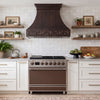 Smooth Curved Custom Copper Range Hood with Decorative Scrollwork Apron