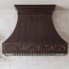 Smooth Curved Custom Copper Range Hood with Decorative Scrollwork Apron