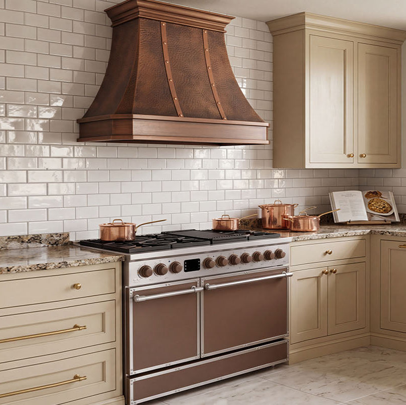 Faceted Curved Custom Copper Range Hood with Vertical Straps and Contrasting Trim